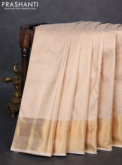 Pure kanchipuram silk saree cream with allover zari woven brocade weaves and rich zari woven border