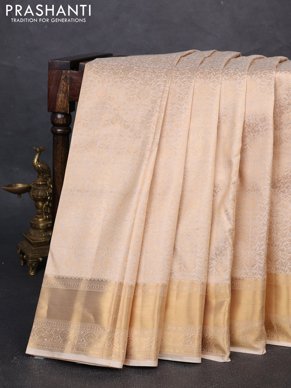Pure kanchipuram silk saree cream with allover zari woven brocade weaves and rich zari woven border