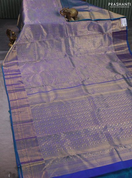 Pure kanchipuram silk saree peacock green shade with allover zari woven brocade weaves and rich zari woven border