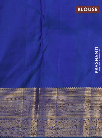 Pure kanchipuram silk saree peacock green shade with allover zari woven brocade weaves and rich zari woven border