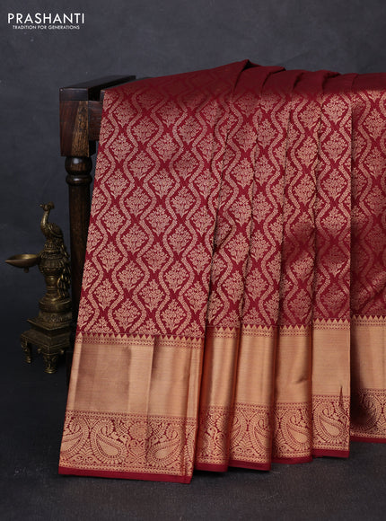 Pure kanchipuram silk saree deep maroon with allover zari woven brocade weaves and rich zari woven border