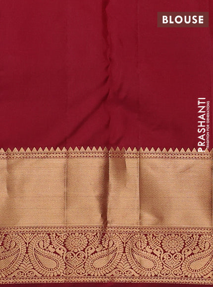 Pure kanchipuram silk saree deep maroon with allover zari woven brocade weaves and rich zari woven border
