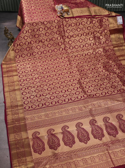 Pure kanchipuram silk saree wine shade with allover zari woven brocade weaves and rich zari woven border