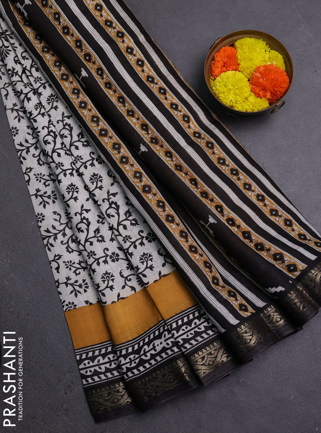 Semi maheshwari cotton saree off white and black with allover prints and zari woven border