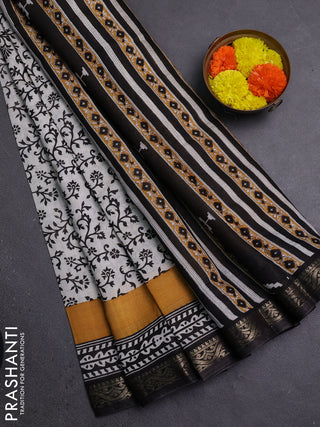 Semi maheshwari cotton saree off white and black with allover prints and zari woven border