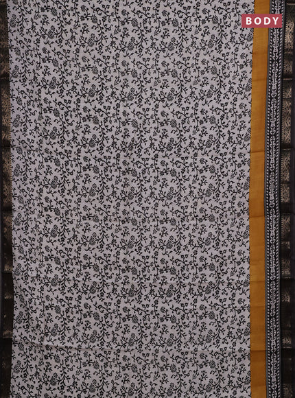Semi maheshwari cotton saree off white and black with allover prints and zari woven border