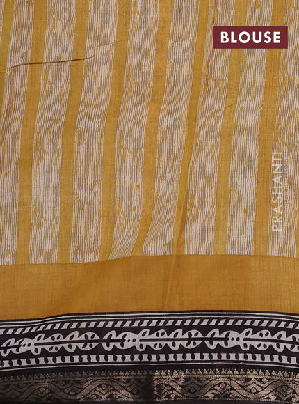 Semi maheshwari cotton saree off white and black with allover prints and zari woven border