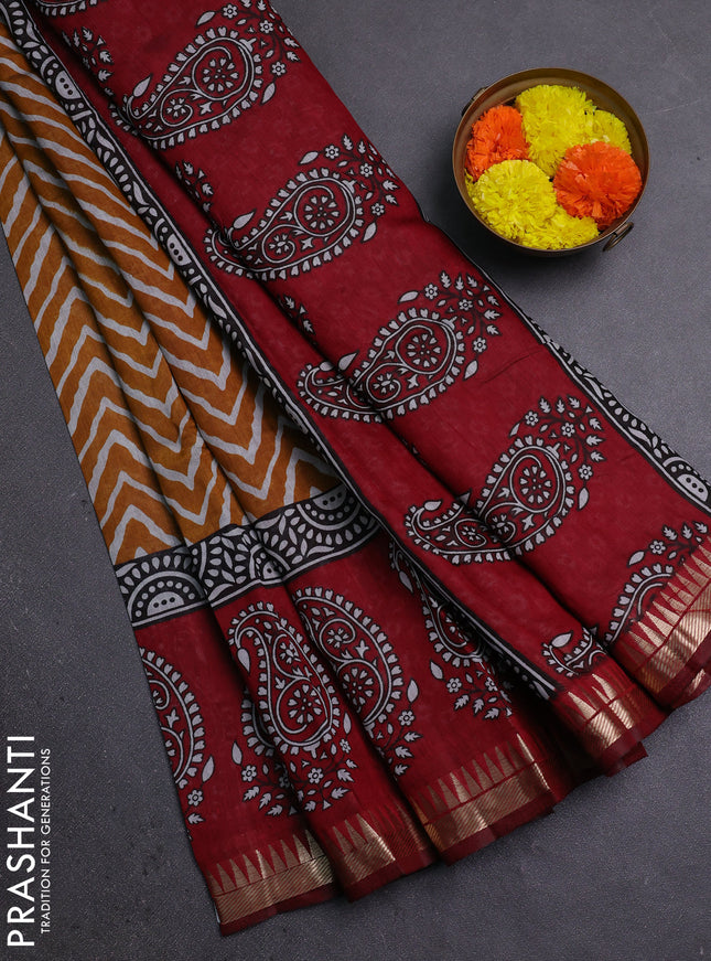 Semi maheshwari cotton saree mustard yellow and maroon with allover zig zag prints and zari woven border