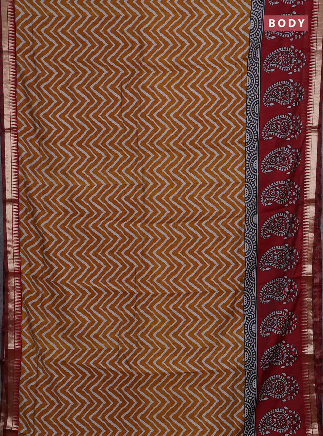 Semi maheshwari cotton saree mustard yellow and maroon with allover zig zag prints and zari woven border