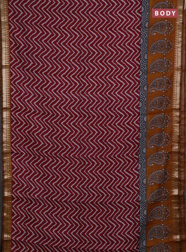 Semi maheshwari cotton saree maroon and mustard yellow with allover zig zag prints and zari woven border