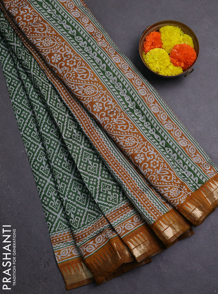 Semi maheshwari cotton saree green and mustard yellow with allover ikat prints and zari woven border