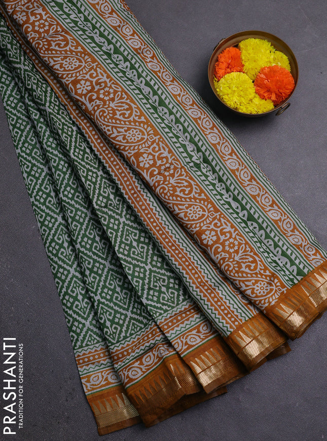 Semi maheshwari cotton saree green and mustard yellow with allover ikat prints and zari woven border
