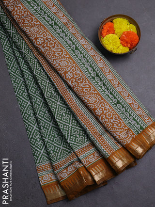 Semi maheshwari cotton saree green and mustard yellow with allover ikat prints and zari woven border