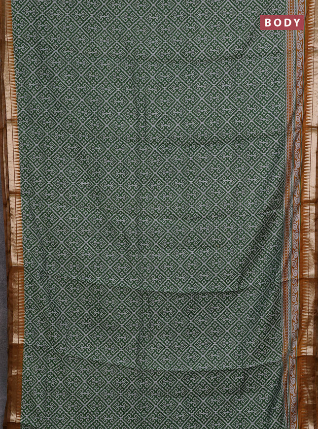 Semi maheshwari cotton saree green and mustard yellow with allover ikat prints and zari woven border