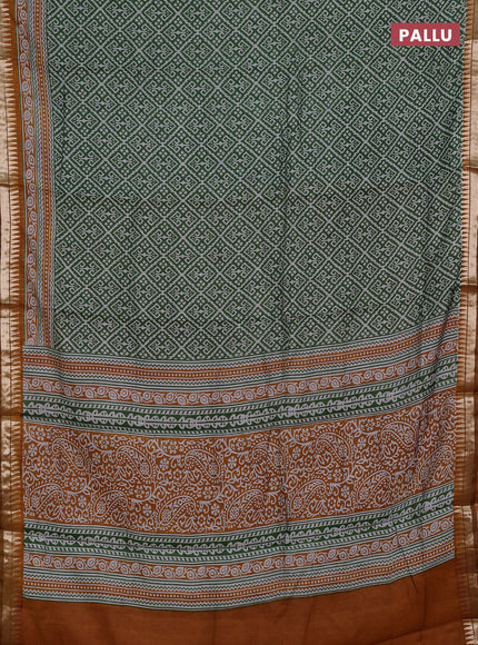 Semi maheshwari cotton saree green and mustard yellow with allover ikat prints and zari woven border