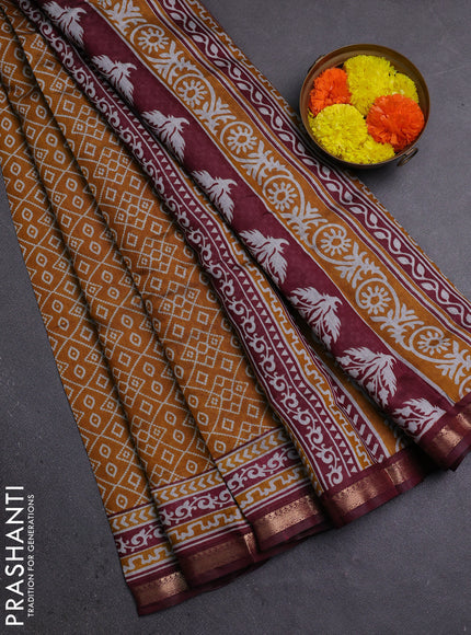 Semi maheshwari cotton saree mustard yellow and deep maroon with allover ikat prints and zari woven border