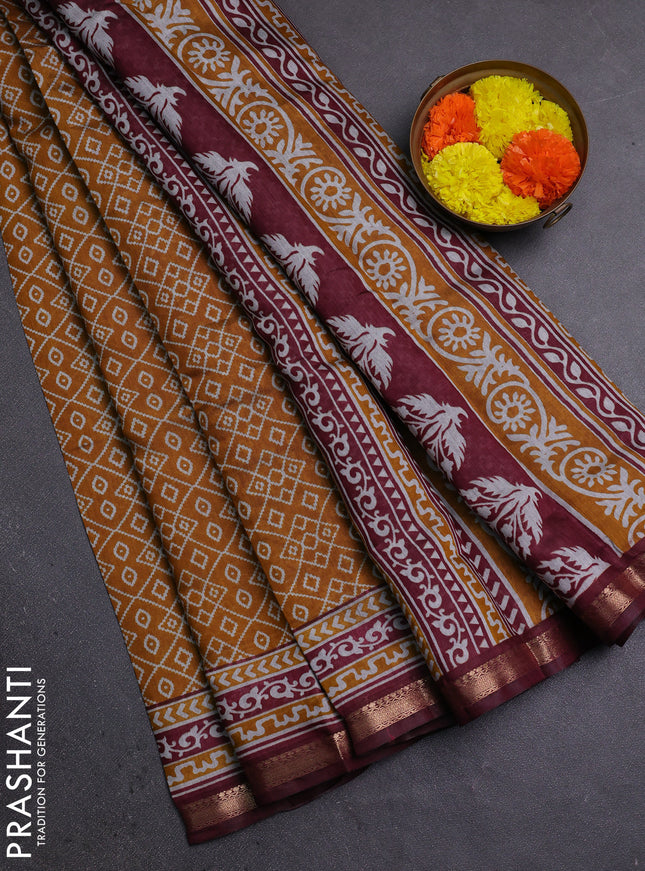 Semi maheshwari cotton saree mustard yellow and deep maroon with allover ikat prints and zari woven border