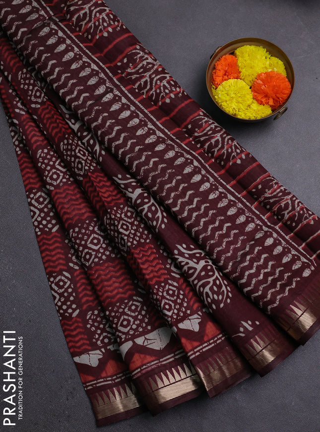 Semi maheshwari cotton saree maroon with allover batik prints and zari woven border