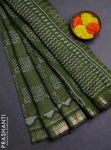 Semi maheshwari cotton saree sap green with allover batik prints and zari woven border