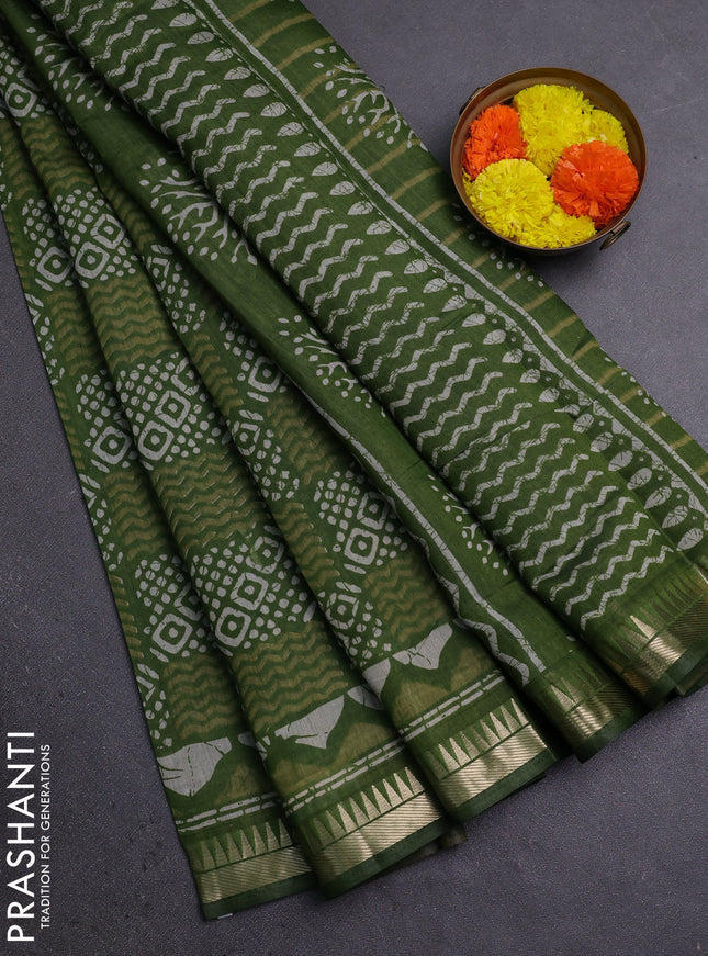 Semi maheshwari cotton saree sap green with allover batik prints and zari woven border