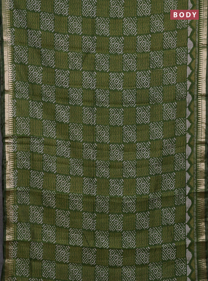 Semi maheshwari cotton saree sap green with allover batik prints and zari woven border