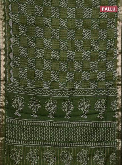 Semi maheshwari cotton saree sap green with allover batik prints and zari woven border