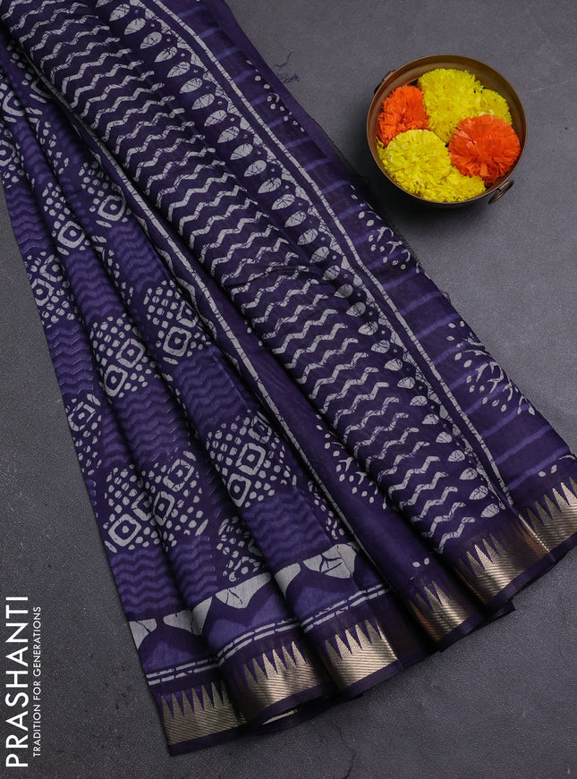 Semi maheshwari cotton saree blue with allover batik prints and zari woven border