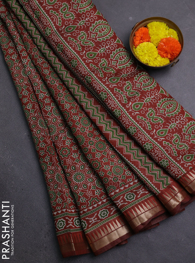 Semi maheshwari cotton saree rust shade with allover ajrakh prints and zari woven border