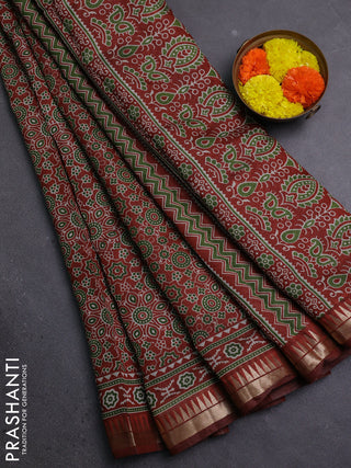 Semi maheshwari cotton saree rust shade with allover ajrakh prints and zari woven border