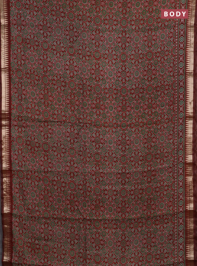 Semi maheshwari cotton saree rust shade with allover ajrakh prints and zari woven border