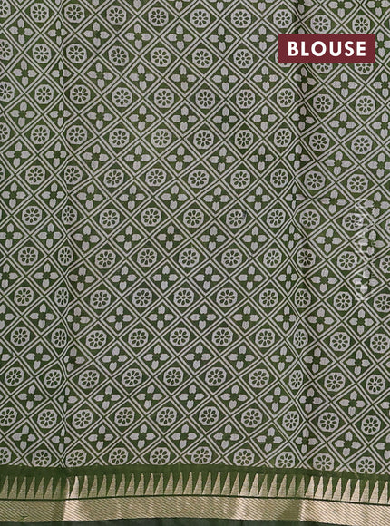 Semi maheshwari cotton saree sap green with allover ajrakh prints and zari woven border