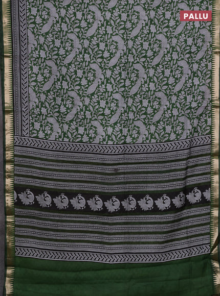 Semi maheshwari cotton saree green with allover kalamkari prints and zari woven border