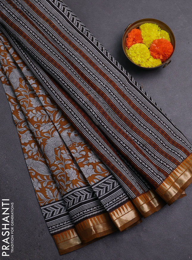 Semi maheshwari cotton saree mustard yellow with allover kalamkari prints and zari woven border