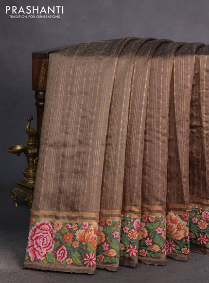 Pure dupion silk saree elaichi green with allover zari weaves and floral embrodery work border