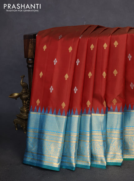 Pure gadwal silk saree maroon and cs blue with zari woven buttas and temple design zari woven border
