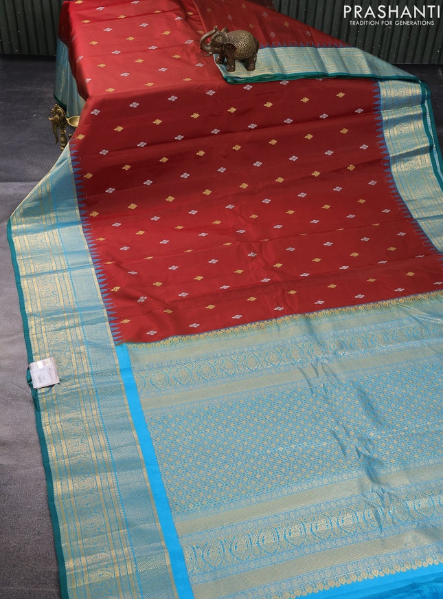 Pure gadwal silk saree maroon and cs blue with zari woven buttas and temple design zari woven border