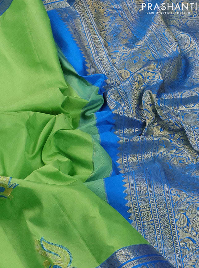 Pure gadwal silk saree light green and cs blue with zari woven buttas and long zari woven border
