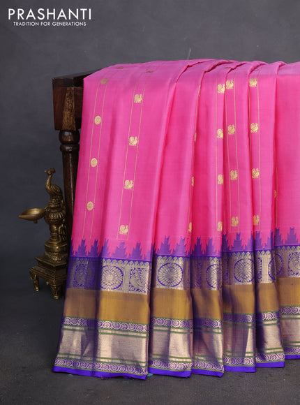 Pure gadwal silk saree pink and blue with zari stripes & buttas and temple design zari woven border