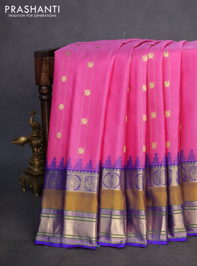 Pure gadwal silk saree pink and blue with zari stripes & buttas and temple design zari woven border