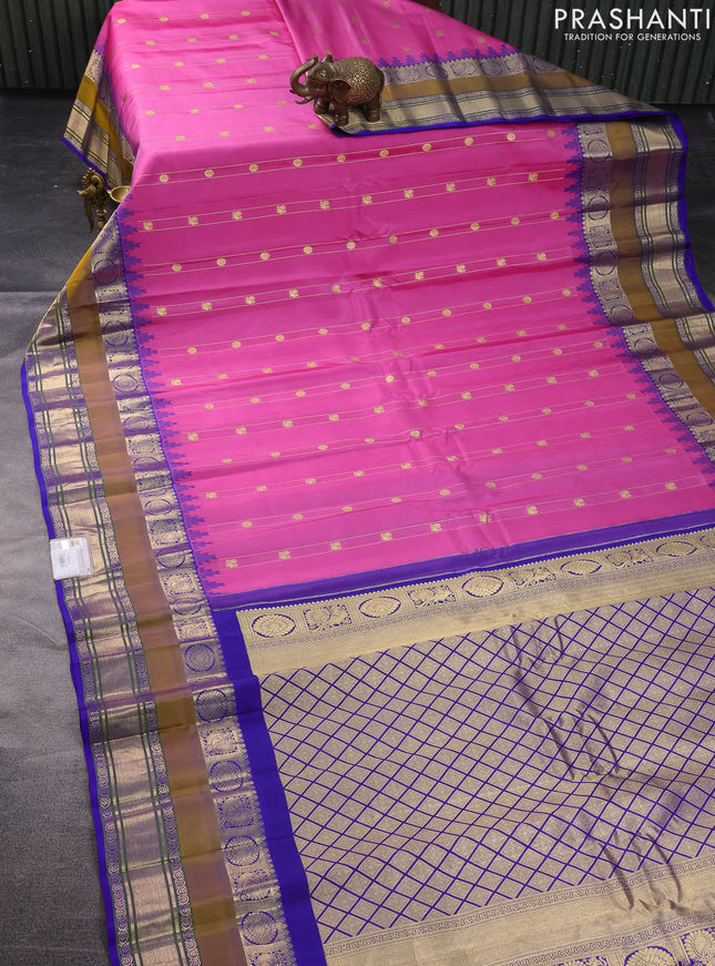 Pure gadwal silk saree pink and blue with zari stripes & buttas and temple design zari woven border
