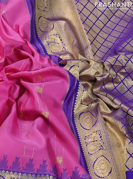 Pure gadwal silk saree pink and blue with zari stripes & buttas and temple design zari woven border