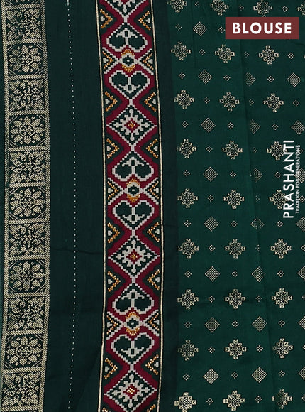 Semi pochampally saree wine shade and dark green with allover patola prints and zari woven border
