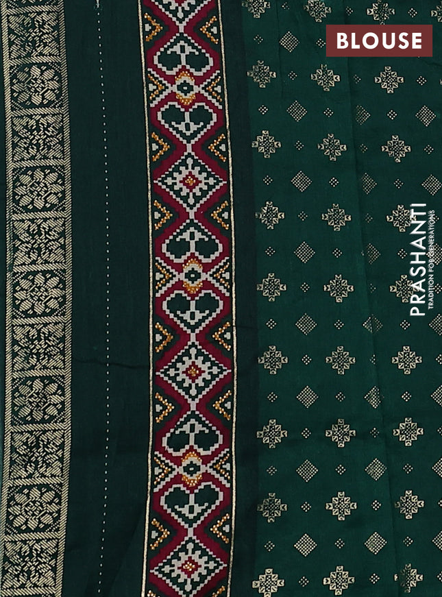Semi pochampally saree wine shade and dark green with allover patola prints and zari woven border