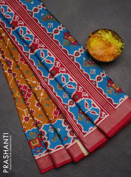 Semi pochampally saree mustard yellow and pink with allover patola prints and zari woven border