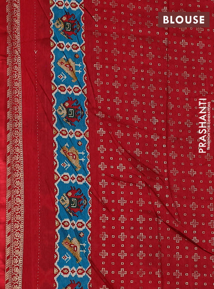 Semi pochampally saree green and red with allover patola prints and zari woven border