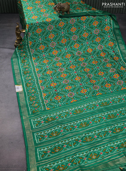 Semi pochampally saree green with allover ikat prints and zari woven border