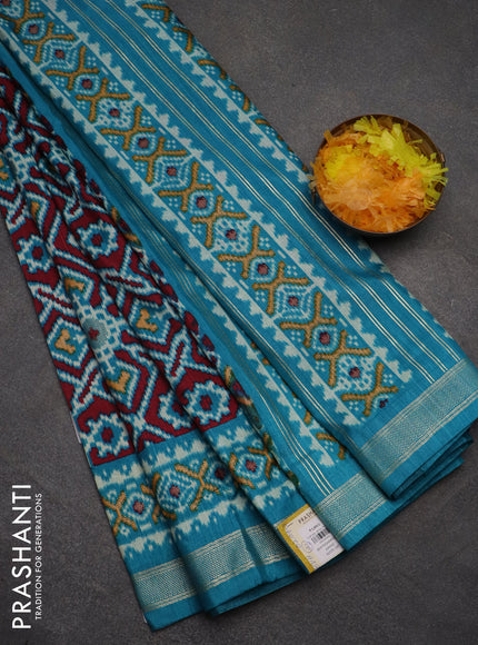 Semi pochampally saree teal blue with allover ikat prints and zari woven border