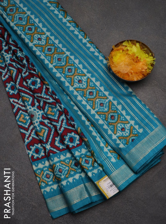 Semi pochampally saree teal blue with allover ikat prints and zari woven border