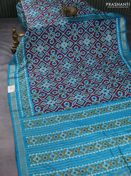 Semi pochampally saree teal blue with allover ikat prints and zari woven border