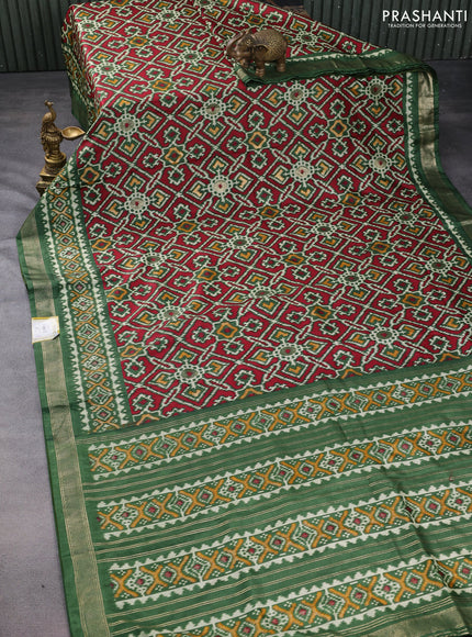 Semi pochampally saree green with allover ikat prints and zari woven border
